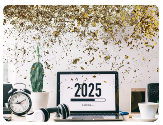 An image showcasing a desk, with laptop, clock, phones, and more. Designed in a festive way to match the new year campaign blog.