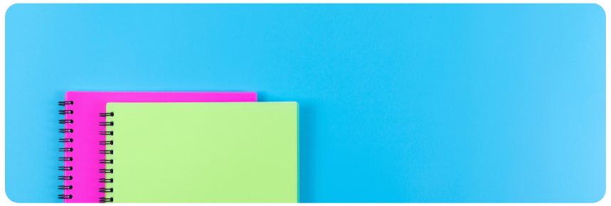 Bright pink and green notebooks on a blue background representing strategy, planning, and creative collaboration — concept image for Netflix and Spotify’s podcast distribution partnership.