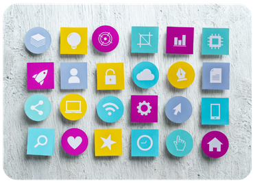 Grid of colorful digital marketing channel icons on a stone surface