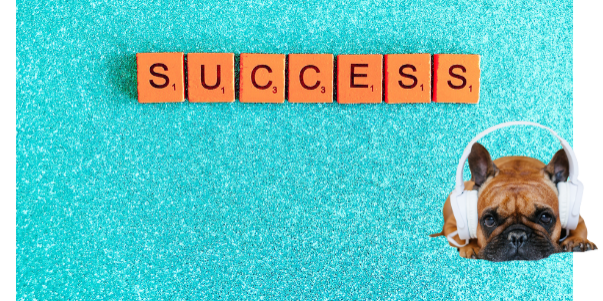 The word success in scrabble style blocks on a glittery aquablue background, with a brown french bulldog wearing headphones in the lower right hand corner.